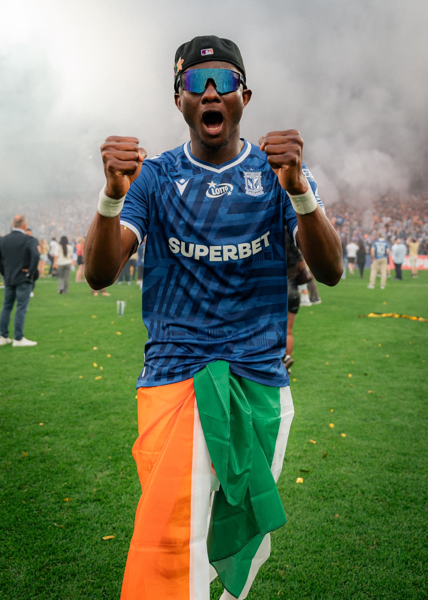 Yannick Agnero celebrating with Ivorian flag